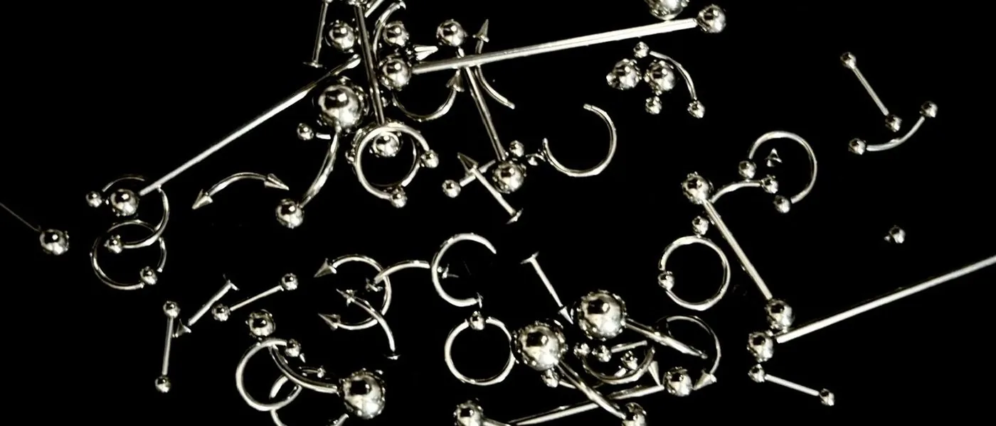 Implant grade jewellery on black, Rebel Tattoos Gurgaon