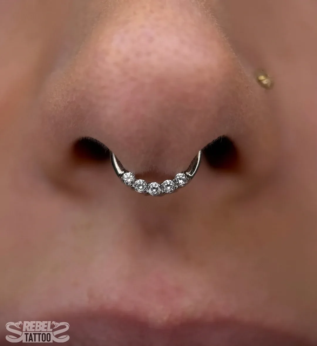 Septum clicker piercing in implant grade titanium, nose piercing at Rebel Tattoos Gurgaon