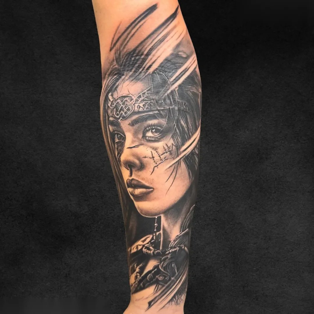 Woman warrior half sleeve, black and grey realism tattoo at Rebel Tattoos Gurgaon
